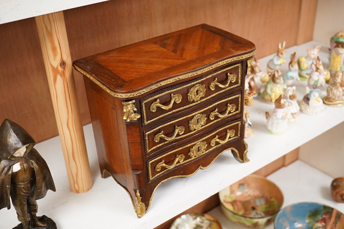 A 19th century French kingwood and gilt metal mounted miniature chest of drawers, 26cm wide x 24cm high